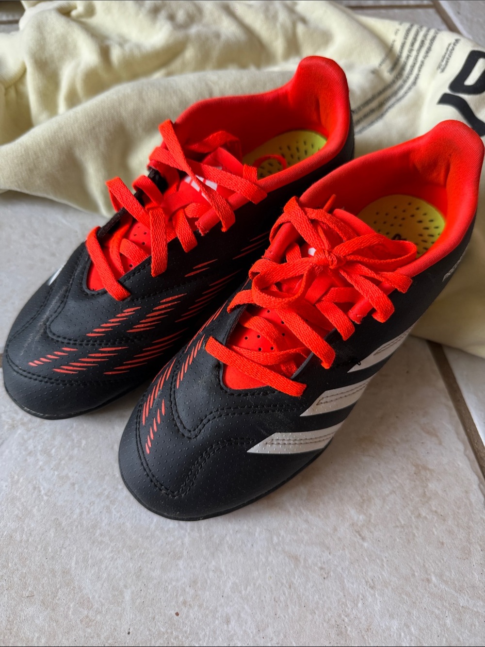 Adidas unisex 24 club turf predator  bright orange Accents